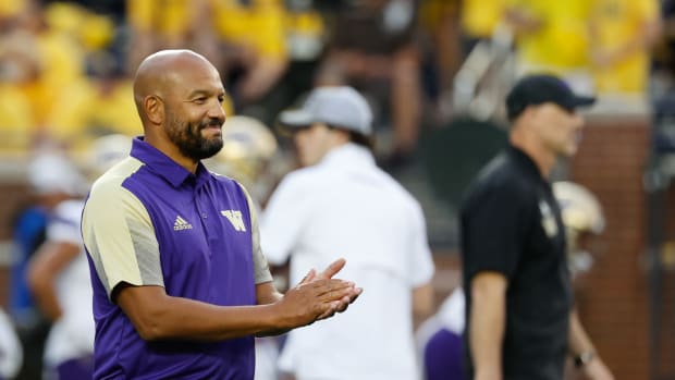 Sep 11, 2021; Ann Arbor, Michigan, USA; Washington Huskies head coach Jimmy Lake during warmups against the Michigan Wolverines at Michigan Stadium.